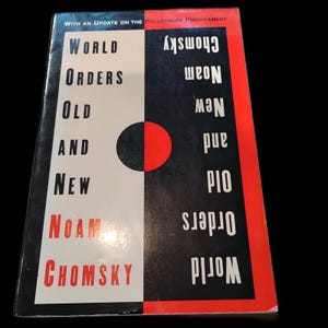 May include: Book cover for "World Orders, Old and New" by Noam Chomsky. The cover is split vertically, with white and black sections. Text includes the title, author's name, and a red and black circular design.