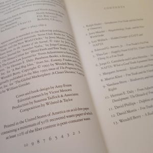 May include: A book titled "Free Trade and the Decline of Democracy" with a white background and black text. The book cover features a list of contents with the names of authors and their respective chapters. The book is printed in the United States of America on acid-free paper.