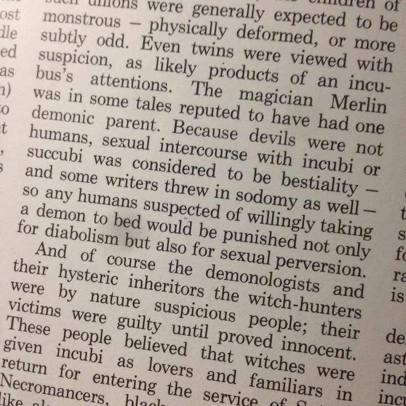 May include: A page from a book with black text on white paper. The text discusses the history of demons and how they were viewed in the past. The text mentions that twins were often viewed with suspicion as being the product of demons.