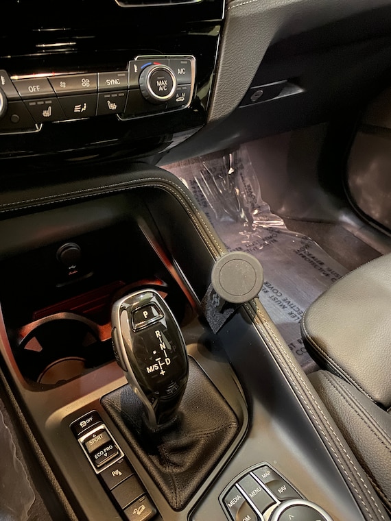 Bmw x1 phone holder outlet