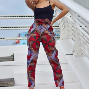 High-waisted belted carrot pants in Moulin rouge wax / women's pants, wax pants, wax pants, colorful pants