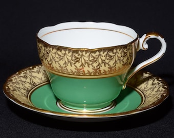 AYNSLEY Vintage Grönt Band Guldblad Chintz Tekopp och Fat Benporslin Guldkantad England 1163