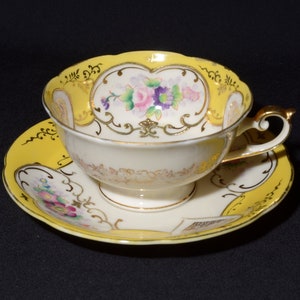 Vintage Shofu China from Japan  Yellow and Cream Teacup and saucer Raised gold design Bone China Hand Painted pink and purple flower heart