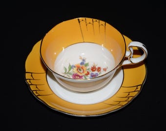 Tasse à thé et soucoupe orange Fenton China Radfords art déco bordé d'or Angleterre 7666 Samuel Radford peint à la main bouquet floral vintage