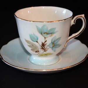 ROYAL GRAFTON &#39;Miranda&#39; Teacup and saucer set in Blue with floral center gold rim Tea Cup Blue Cups Bone China Cup