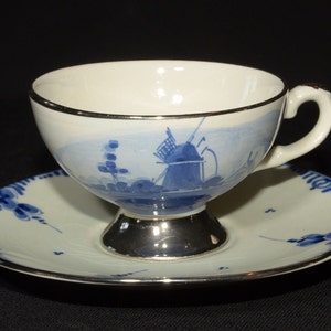 Deltf Bone China Demitasse Cup and Saucer Set Teacup Handpainted Holland blue and white windmill footed silver tone rim and foot floral