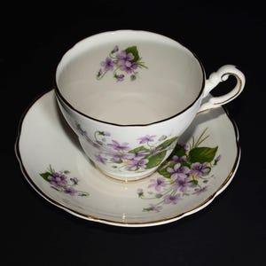 REGENCY Teacup and saucer Purple flowers Gold Rimmed England Vintage Bone China 1950s