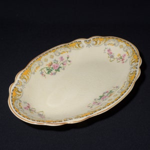 Vintage viktoriansk Brittany Johnson Brothers Johnson Bros liten tallrik undertallrik 20 cm lång England svart gul blommig art nouveau CRAZING CHIP