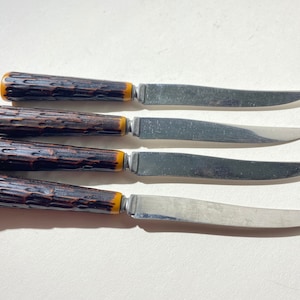 Vintage set of 4 stainless steel bakelite handles knife set cutlery Canada brown caramel unmarked
