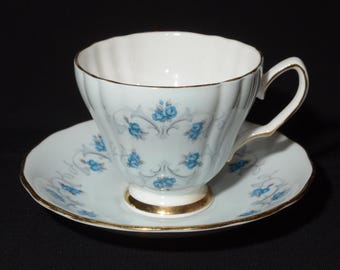 COLCLOUGH Bone China pale blue teacup and saucer numbered Blue flowers Gold Rimmed Ridgway Potteries 8251 England Vintage tea cup