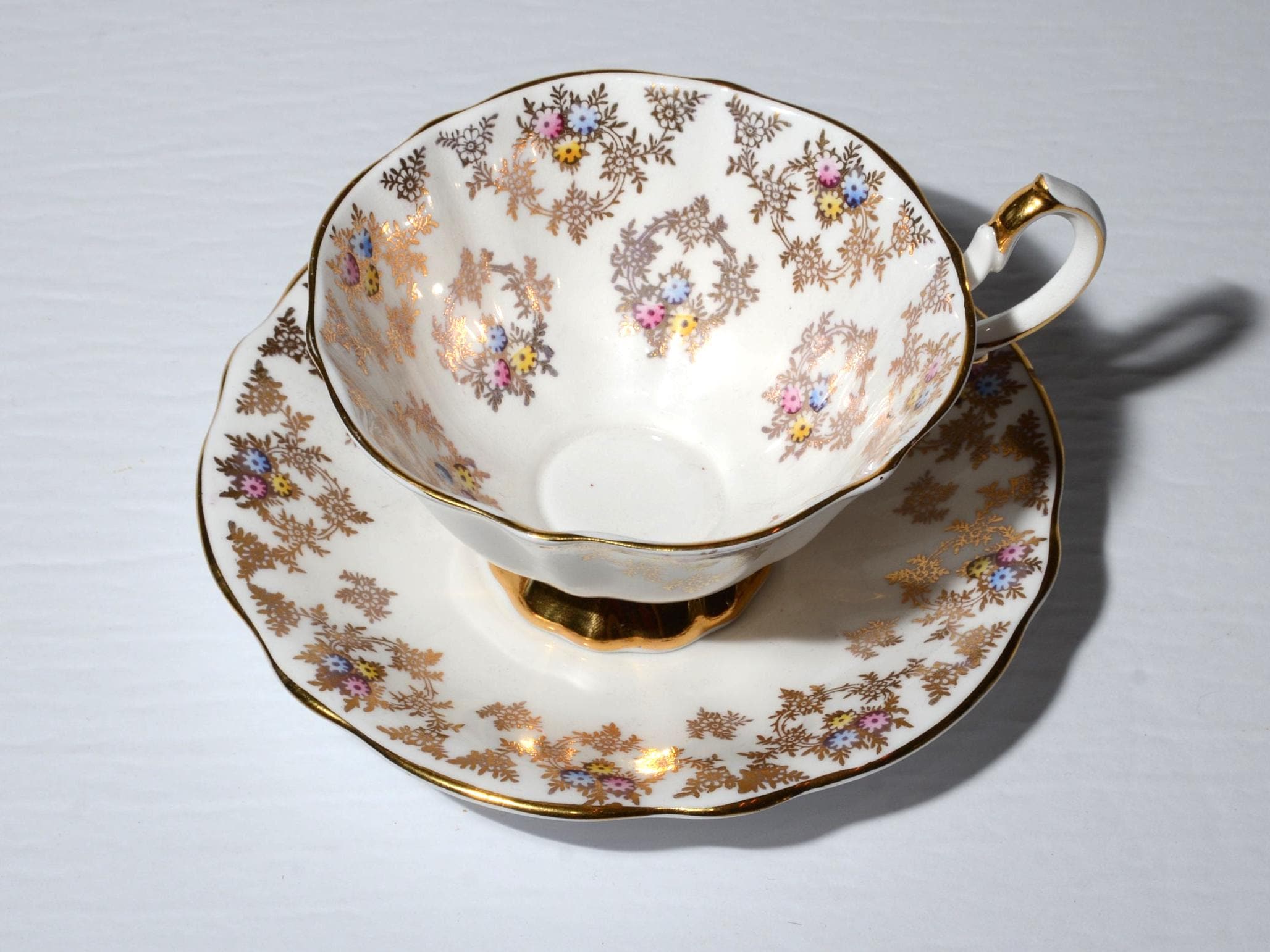 QUEEN ANNE Bone China Gold Chintz Gold and Tiny Floral Tea Cup and