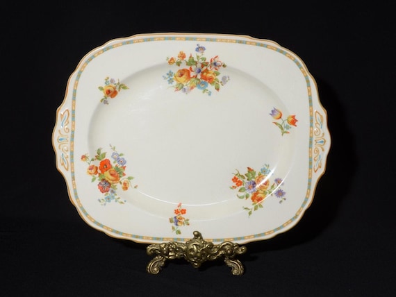 アンティークプレート W.H. Grindley イギリス1 W.H. Grindley and Co Ivory Serving Plate Handle Porcelain Vintage