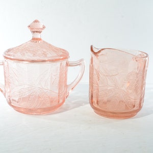 Jeannette Glass FLORAL POINSETTIA Pink Depression Glass creamer and sugar Pressed Glass lid