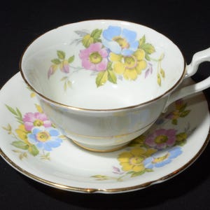 STANLEY Teacup and Saucer Set Yellow Multicolor Flower Fine Bone China Tea cup England gold rim blue yellow pink numbered tiny CHIP on foot