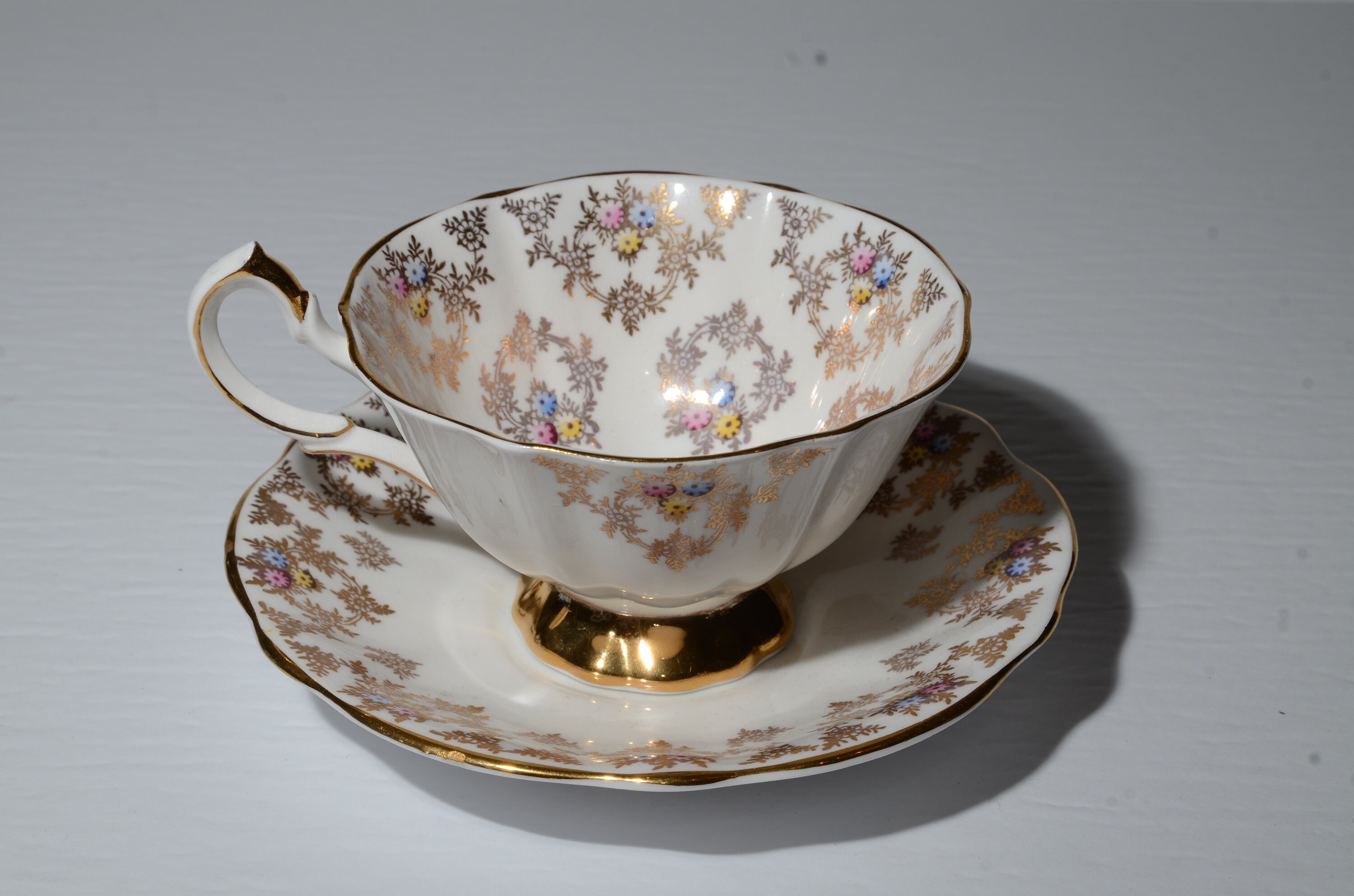 QUEEN ANNE Bone China Gold Chintz Gold and Tiny Floral Tea Cup and