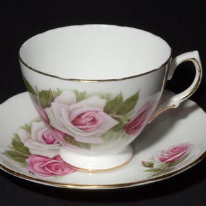 ROYAL VALE Bone China tea cup and saucer set pink rose flowers floral design Ridgway Potteries Ltd  numbered 8138