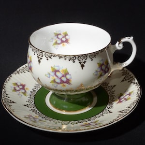 ROSINA Teacup and saucer set  England Footed green band lily of the valley flower May FLAWS