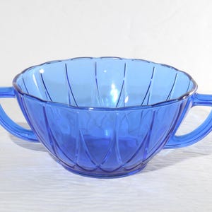 HAZEL ATLAS GLASS Co Cobalt Blue Depression Glass Newport Hairpin handled cream soup bowl blue glass
