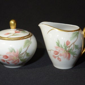 Johann Seltmann Vohenstrauss Bavaria creamer and sugar bowl with lid West Germany 1691 pink blossom tiny chip on sugar bowl gold rim ot