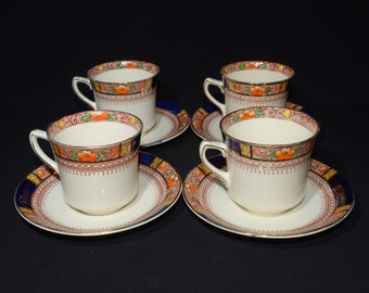 J&G Meakin Sol Queen Mary set of 4 teacup and saucer band England ironstone 391413 gold cobalt rim rust yellow flowers