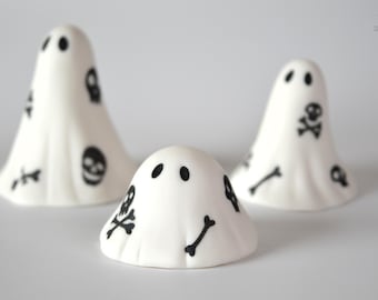 Spooky Ghost Sculpture Ceramic Skull and Cross Bone Pirate Ghost Figure
