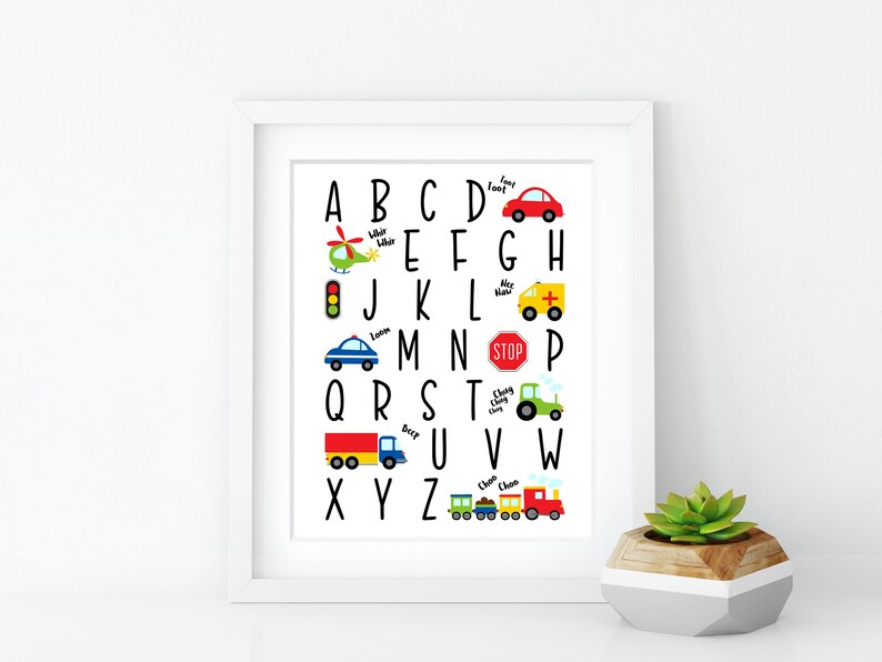 May include: A colorful alphabet chart featuring vehicles and transportation. Each letter of the alphabet is paired with a different vehicle, such as a car, truck, helicopter, ambulance, and train. The letters are in black and the vehicles are in bright colors. The chart is perfect for teaching children the alphabet.