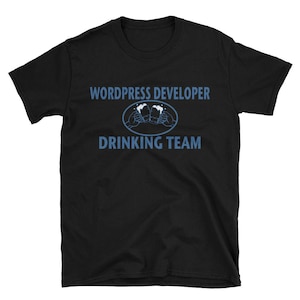 May include: Black t-shirt with the text "WordPress Developer Drinking Team" in blue lettering. The design features a graphic of two people raising a glass of beer.