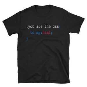 May include: Black t-shirt with white text that reads '.you are the css{ to my:html; }'.