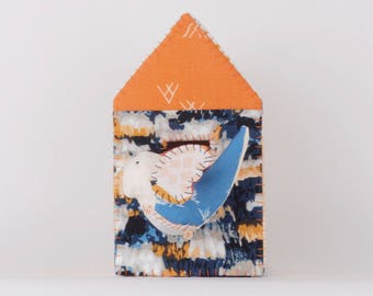 House wall fabric, with his bird to hang on the wall, rust/blue/yellow colored fabrics.