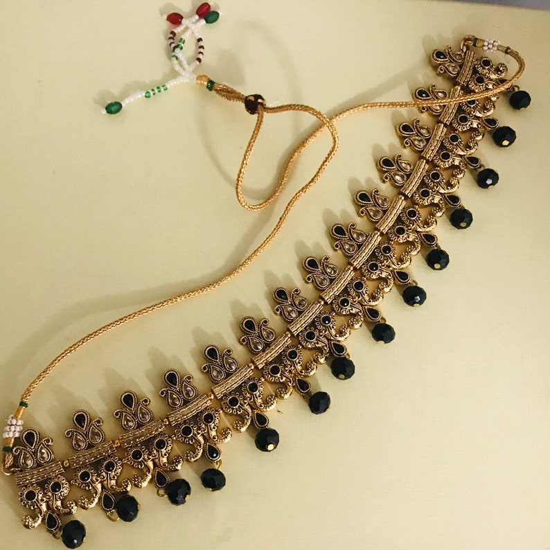 Gold and black pearl choker necklace jhumka earrings and tikka set Indian bridal pakistani jewelry