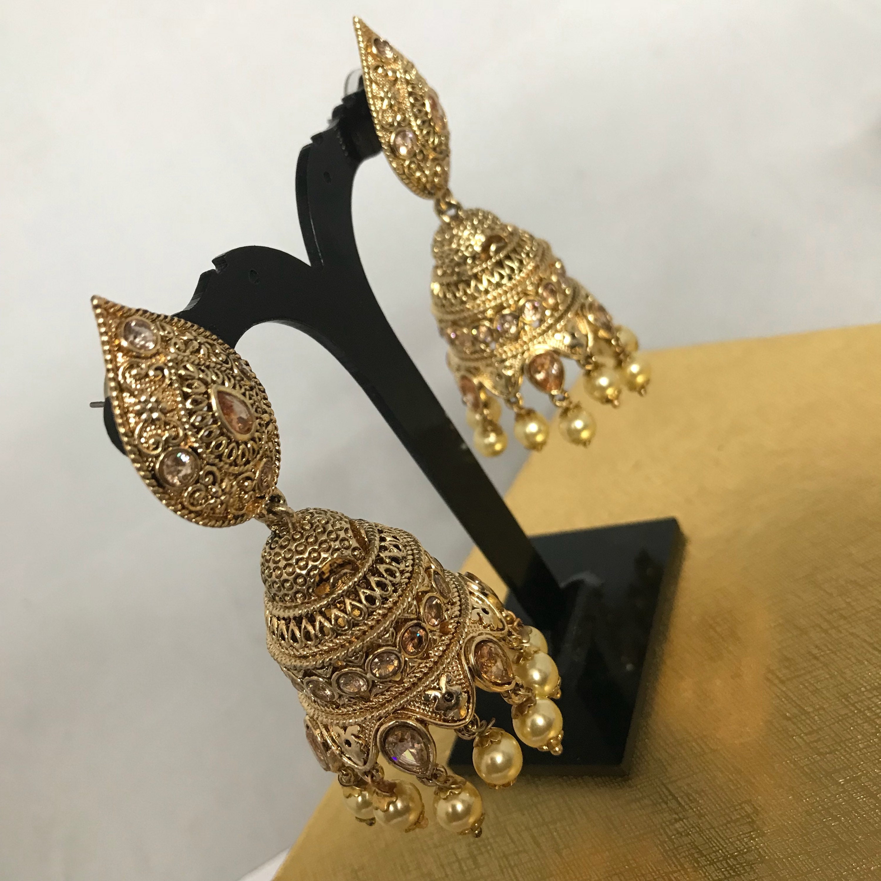 Daliah gold zirconia pearl jhumka earrings