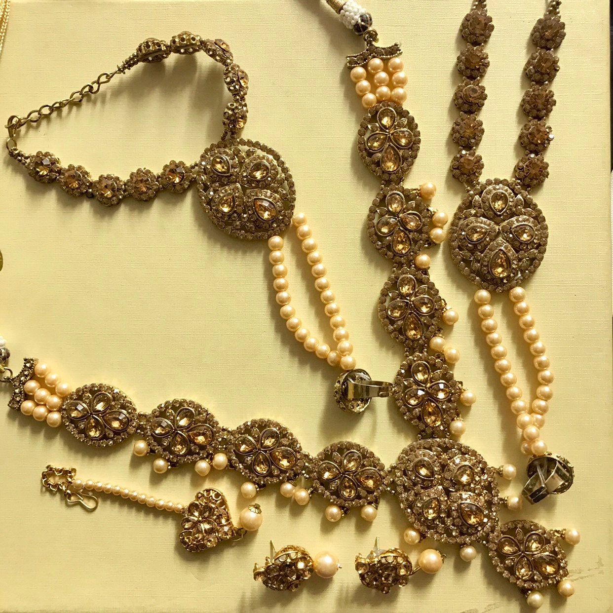 Sapna Gold pearl necklace tops earrings tikka handpiece set wedding ...