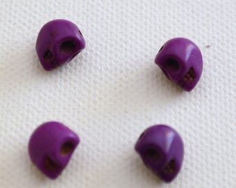 Set of 4 beads in violet 10mm Howlite stone skull