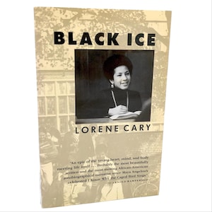 May include: A book titled "Black Ice" by Lorene Cary. The cover features a black and white photo of a woman writing. The book's cover has a beige background with text and a quote from Arnold Rampersad.