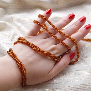 Vintage 1970s Golden Beaded Necklace: Long Braided USSR Plastic Bead Strand