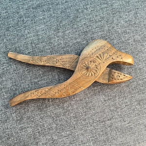 Vintage Wooden Nutcracker with Intricate Carved Design, Rustic Kitchen Decor