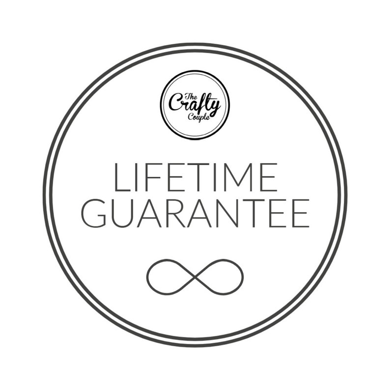 May include: A black and white circle with the text "The Crafty Couple" and "LIFETIME GUARANTEE" inside. An infinity symbol is below the text.
