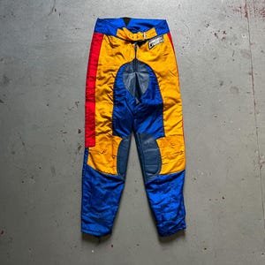 Lookwell Leathers motocross pants, vintage 70s Dutch blue yellow multicolor padded biker riding nylon racing trousers, size S, W 29