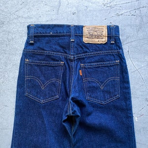 vintage levis jeans, 80s deadstock Levis 639-0217 dark blue indigo denim pants, size 26 x 34