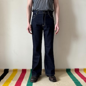 Y2K 00s vintage UFO jeans NOS deadstock dark blue raw flare bell bottom alien unisex denim 31x32 lot