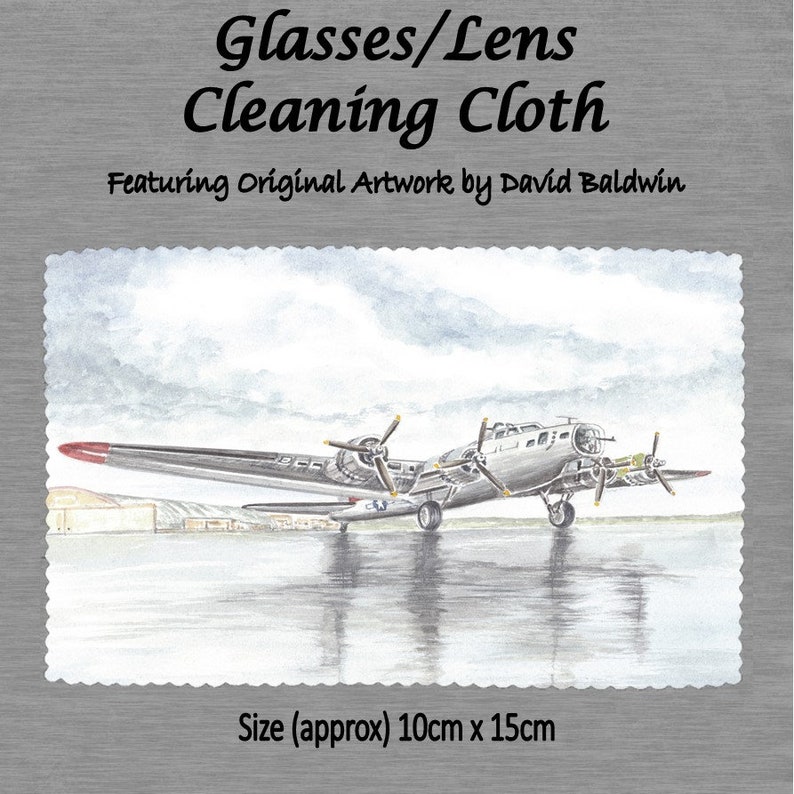 May include: A gray and white watercolor illustration of a vintage airplane on a cleaning cloth. The cloth is designed for cleaning glasses and lenses. The cloth measures approximately 10 inches by 15 inches.