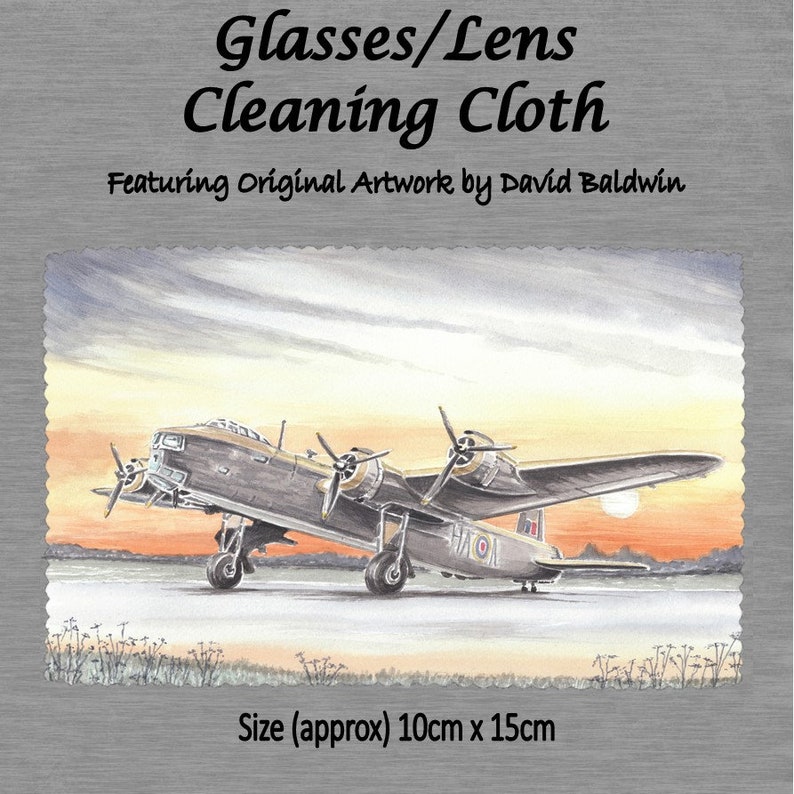 May include: A cleaning cloth featuring an original watercolor illustration of a vintage airplane against a sunset sky. The cloth is approximately 10 inches by 15 inches.