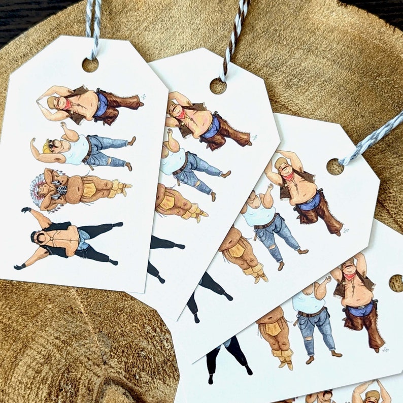 May include: Gift tags with illustrations of men in various outfits, including a cowboy, a Native American, and a biker. The tags are white with a hole at the top and are strung with twine. The background is a textured, brown surface.