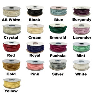 May include: Spools of various colored pearl beads, including AB White, Black, Blue, Burgundy, Crystal, Cream, Emerald, Lavender, Red, Royal, Fuchsia, Mint, Gold, Pink, Silver, White, and Yellow.