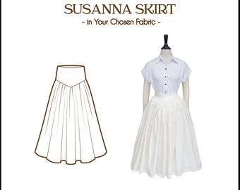 Puede incluir: Imagen que presenta una falda Susanna hecha a medida. La imagen incluye un boceto de la falda y un maniquí que lleva una falda blanca y una camisa blanca de manga corta. El texto dice "Tailor-Made Susanna Skirt - In Your Chosen Fabric - Brill Ladies."