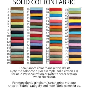 May include: A color chart of 76 solid cotton fabric swatches. The swatches are numbered 1 to 76. The chart is labeled "SOLID COTTON FABRIC".