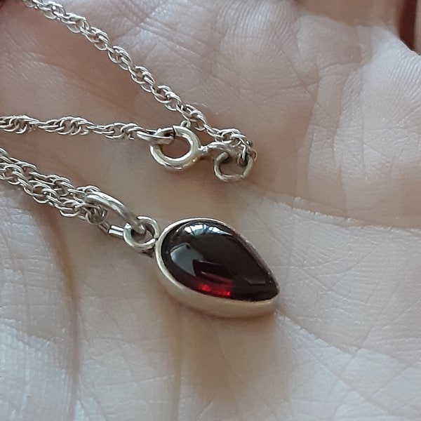 Minimalist vintage deep red/purple glass and silver pendant on a silver chain