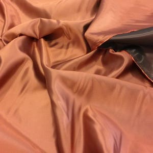 Double-sided iridescent copper/black satin, haute couture satin, iridescent copper rayon/viscose satin, width 160 cm 1.75 yd. image 2