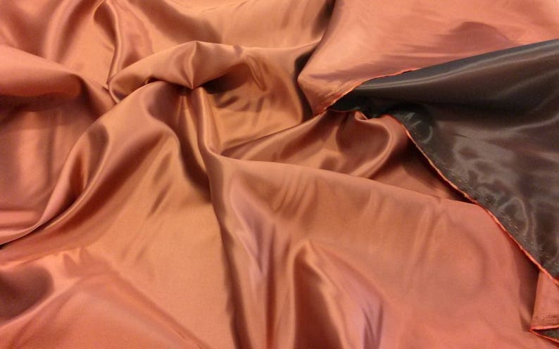 Double-sided iridescent copper/black satin, haute couture satin, iridescent copper rayon/viscose satin, width 160 cm 1.75 yd. image 2