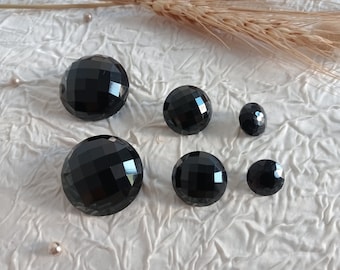 Black fancy button, haute couture button in half-ball shape imitating jet, faceted, black half-ball faceted button imitating jet.
